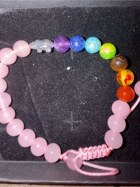 Glass and stone bracelet with elephant charm